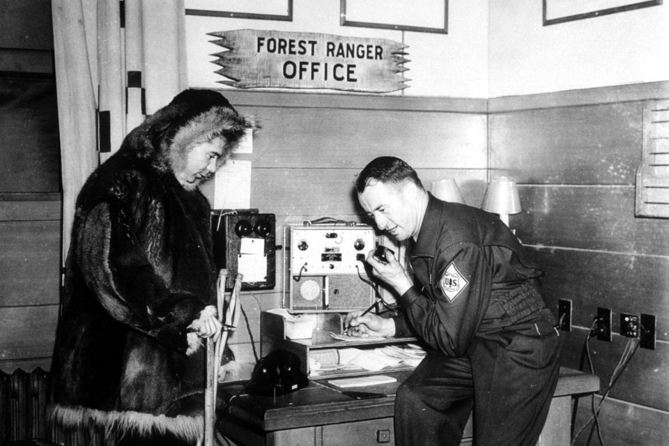 156 Snow Ranger with District Ranger at office in Timberline Lodge