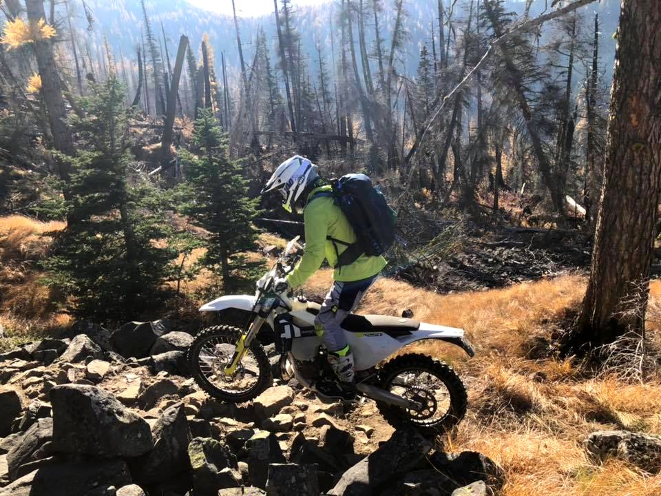 Motorcycle-ridingOverRocksOkaWenNFbyMasonSchuurUSFS-Oct2018