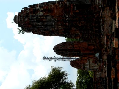 Modern vs ancient towers in Ayutthaya photo