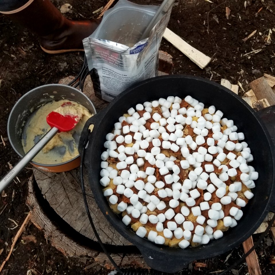 ChelanRidgeHawkWatchSnowEvent-DutchOvenCooking(1) ChelanRD-OkaWenNFbyJanet MillardUSFS 2019-10-03