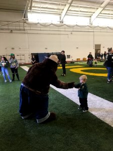 Making Christmas ornaments at the University of Oregon spring football game.