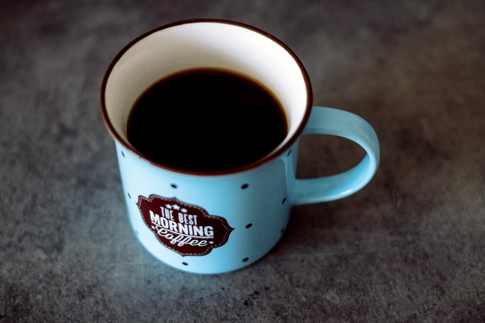 Black coffee in a retro mug photo