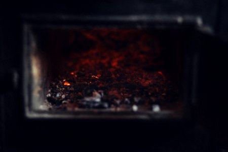 Old stove ashes and embers photo