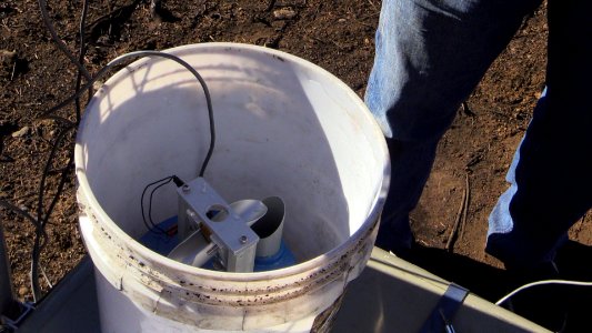 The rain gage used here is a type known as a "tipping bucket rain gage" and it measures rainfall in 0.01 inch increments. The total rain is tallied and transmitted once an hour.