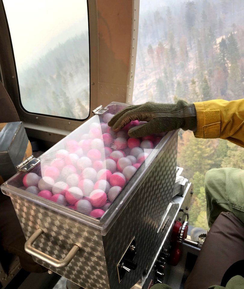 The plastic sphere dispenser in air and ready to be deployed, Boyds Fire, Photo Credit Paul Tester