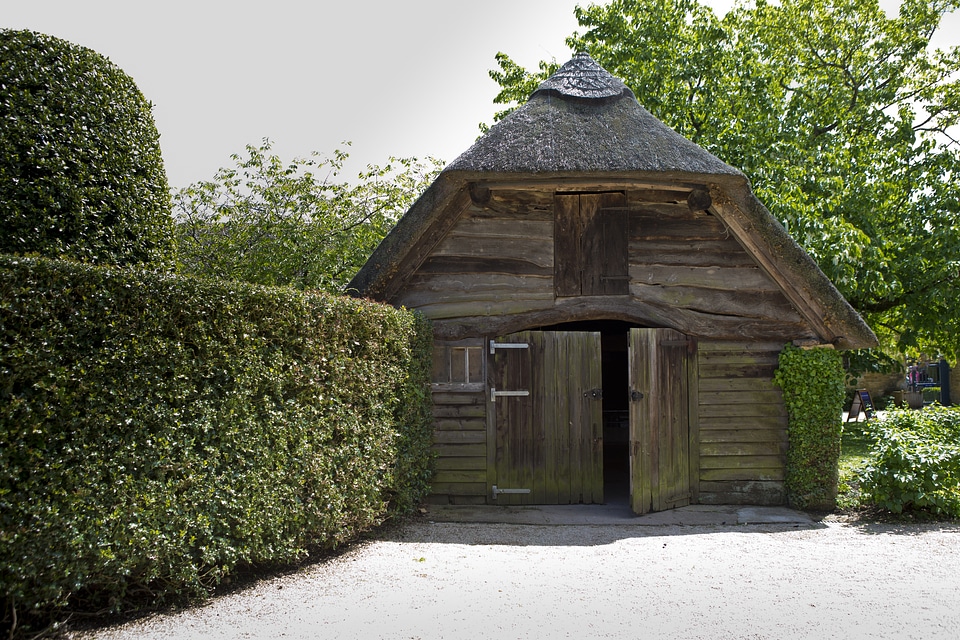Thatched roof topiary hedging hidcote manor garden