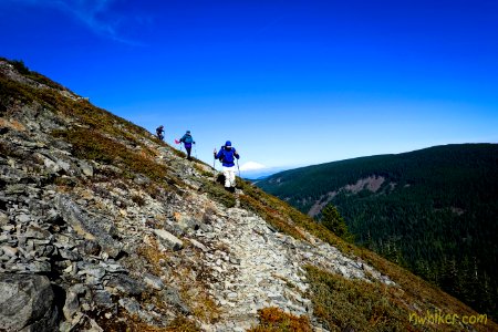 20191023 MtHood Three hikers descending a summit in Wahtum Lake area, by Dean Kokko.