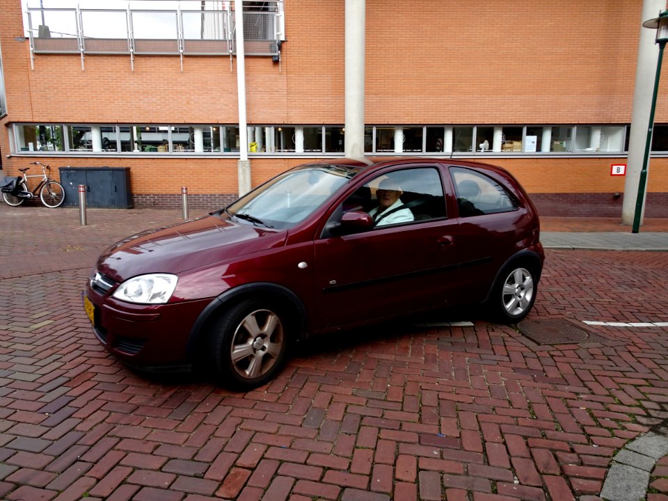 Man driving a car photo