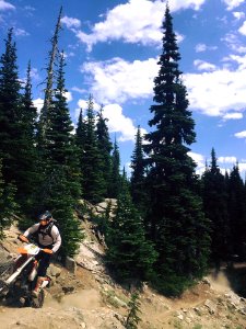 Motorcycle-FS TrailCrewPersonCodyStantonRidingNasonRidgeTrail-OkaWenNFbyMasonSchuurUSFS-July7-2017