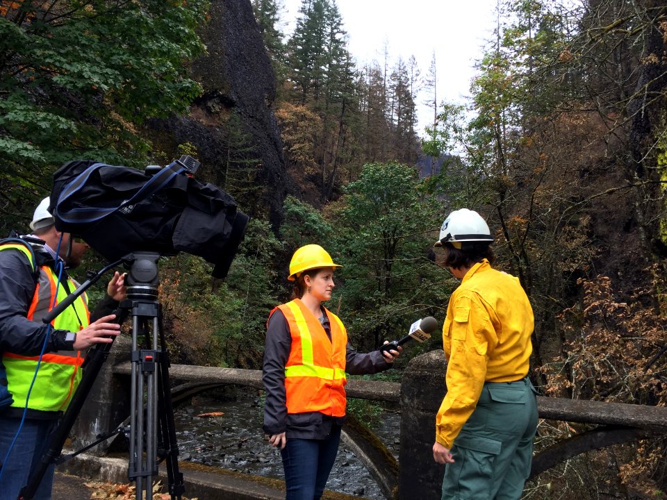 Scenic Area Public Affairs Officer is interviewed by the media at Oneota Gorge