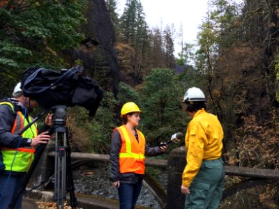 Scenic Area Public Affairs Officer is interviewed by the media at Oneota Gorge