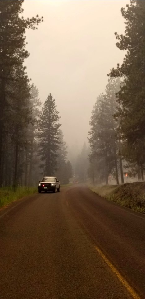 A firefighting vehicle drives past the Canyon 66 Prescribed fire