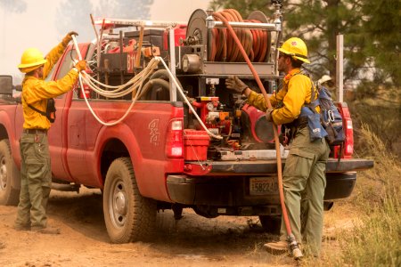 Firefighters conducting burnout operation