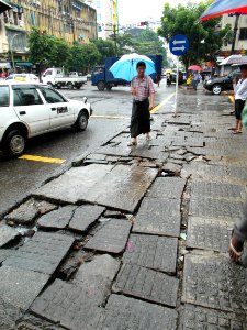 Broken streets in Yangon photo