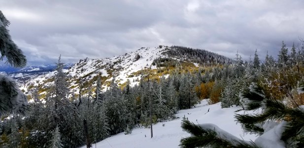 ChelanRidgeHawkWatchSnowEvent-ViewOfObsPointFromNorthBlindObsIsTheRockyPileNearTopLeft ChelanRD-OkaWenNFbyJanet MillardUSFS 2019-09-30