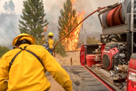 Firefighters conducting burnout operation