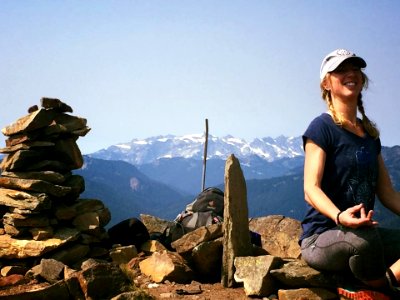 Hiker-KatyBinderRelaxingOnMthTop-OkaWenNFbyMasonSchuurUSFS-Aug28-2018