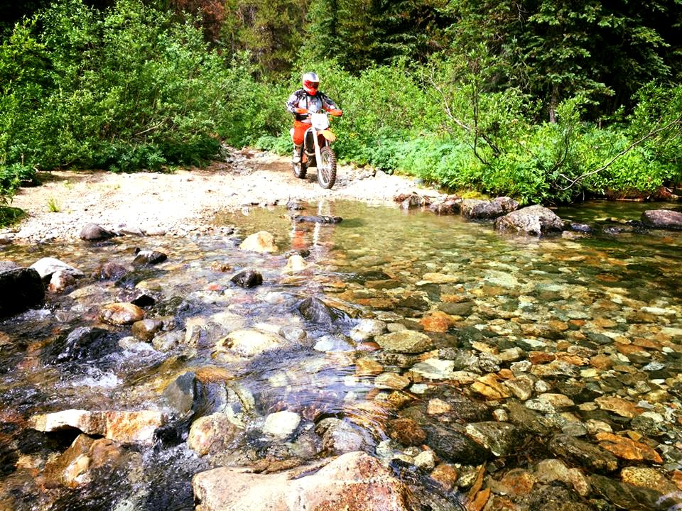 Motorcycle-MotorcycleAboutToCrossMadRiver-EntiatRD-OkaWenNFbyMasonSchuurUSFS-July28-2018