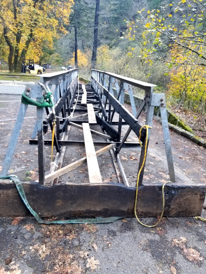 20191023 CRGNSA Damaged High Bridge after being removed from Eagle Creek Trail. (USDA Forest Service photo by Edan Lira)