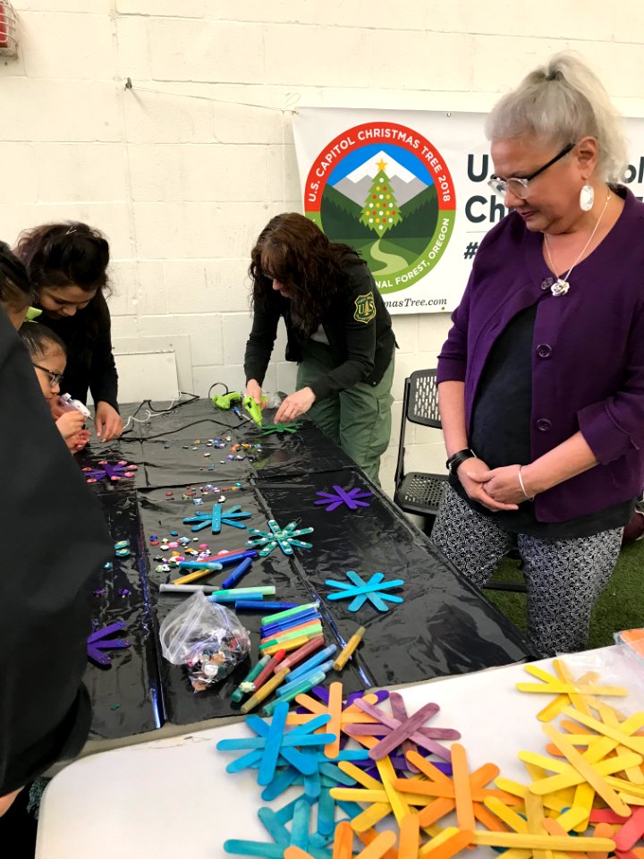 Making Christmas ornaments at the University of Oregon spring football game.