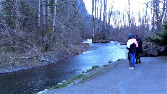 Visitors enjoying Multnomah Falls area after the lodge reopened post fire.