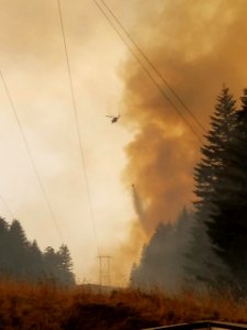 Helicopter carries water to the Eagle Creek Fire Sept. 8, 2017