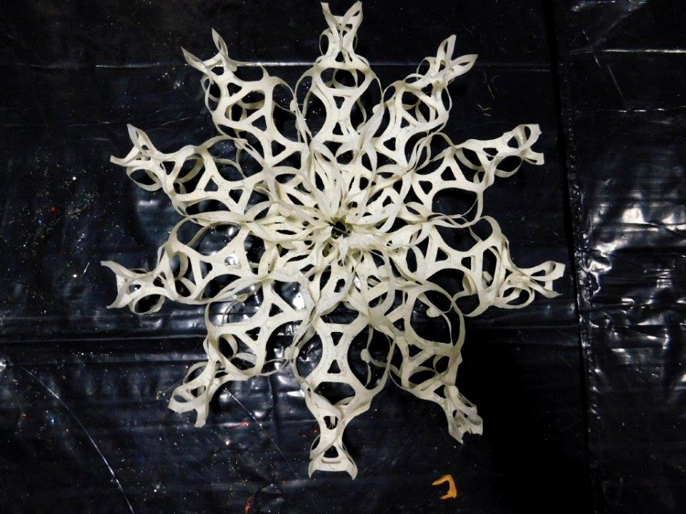 Plastic 6 pack holders made into a snowflake