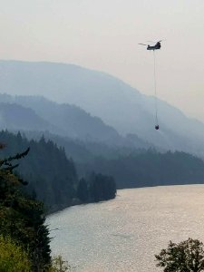 Helicopter carries water to the Eagle Creek Fire on September 8, 2017