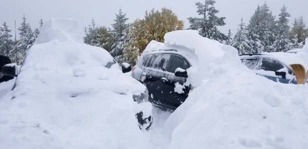 ChelanRidgeHawkWatchSnowEvent-DiggingOutVehicles(5) ChelanRD-OkaWenNFbyJanet MillardUSFS 2019-09-29 photo