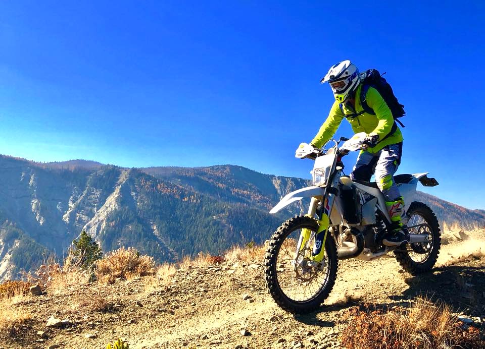 Motorcycle-FS TrailCrewPersonOnMotorcycleOkaWenNFbyRandyDietrichUSFS-Oct2018