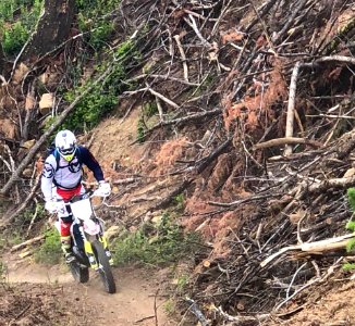 Motorcycle-FS TrailCrewPersonOnMotorcycle-Certifying USFS employees for trail motorcycles(1)OkaWenNFbyMasonSchuurUSFS-June2019 photo