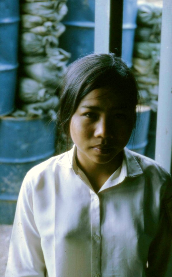 Vietnamese worker at Vung Chua Mountain signal station