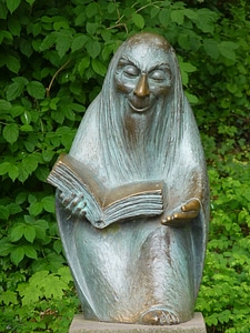 Statue fairy tales book photo