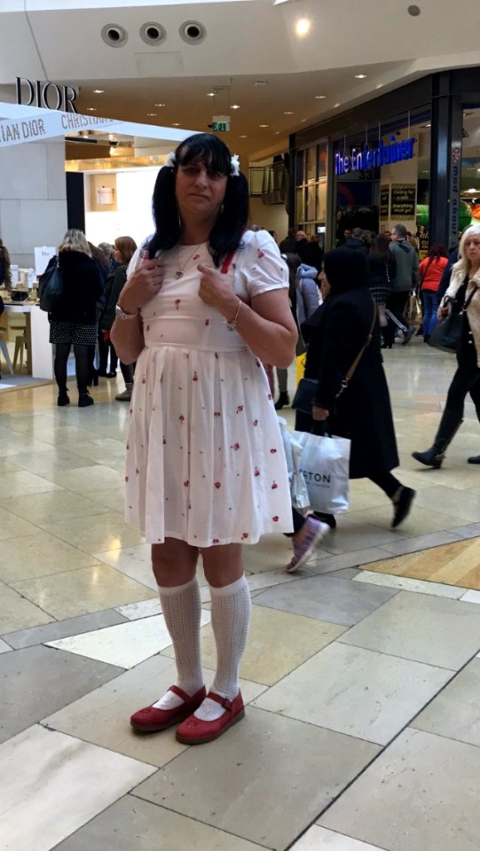 dressed as a little girl for a day out shopping photo