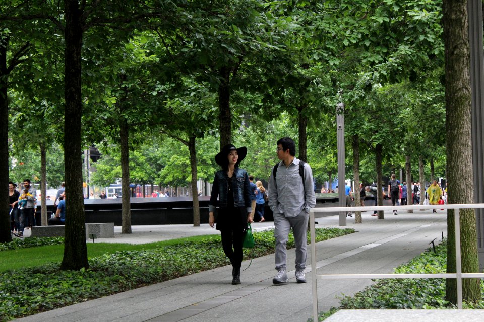 Asian tourists near 911 memorial