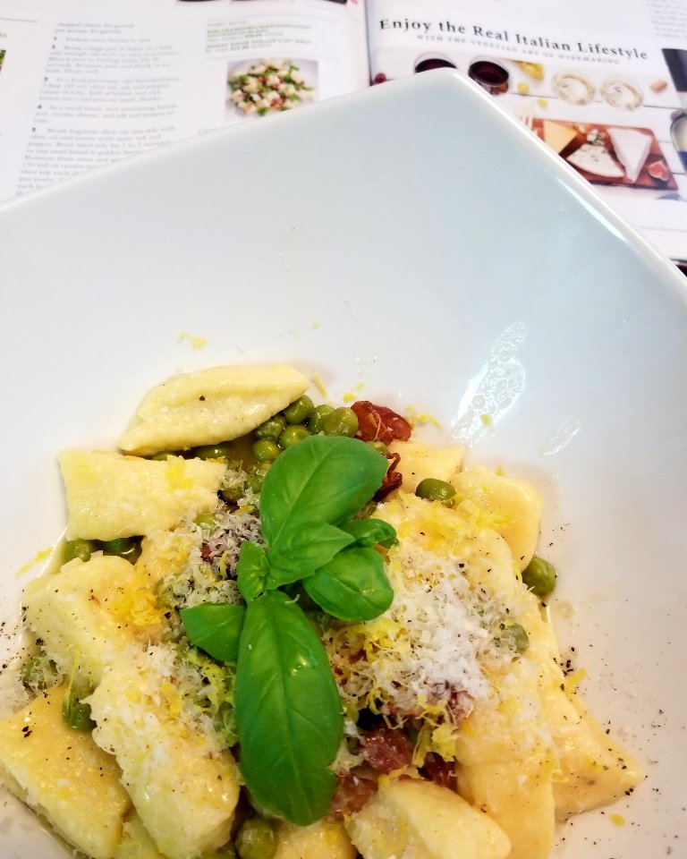 Ricotta gnocchi with pancetta,  peas, and lemon