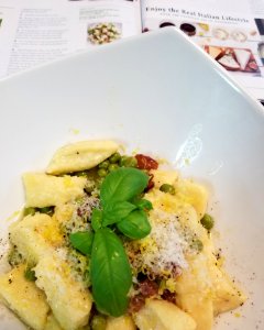 Ricotta gnocchi with pancetta,  peas, and lemon
