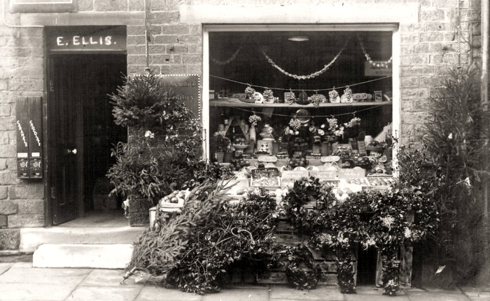 1920s photograph of the Christmas display at E. Ellis' Shop, Honley