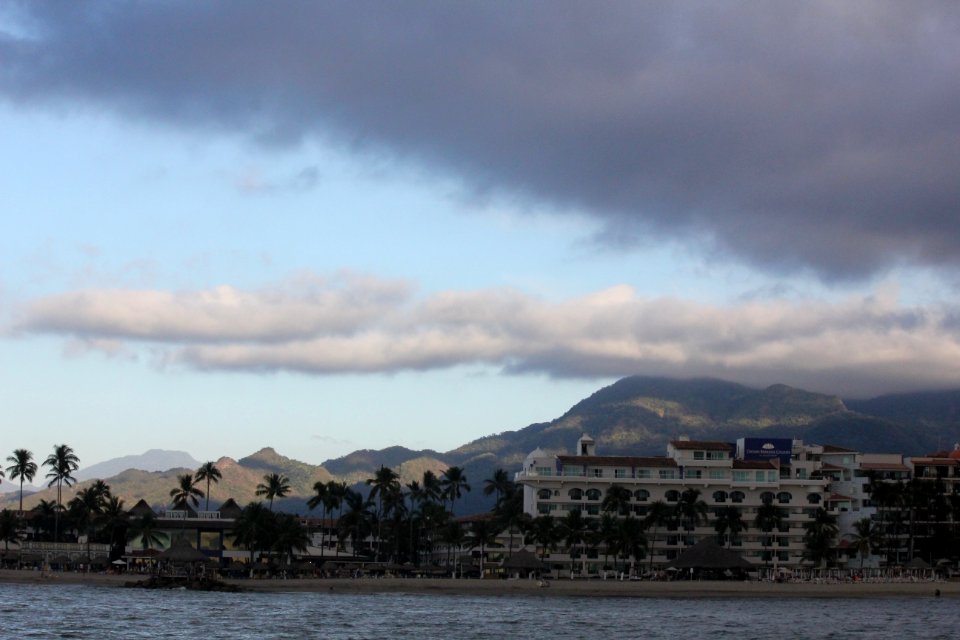 Cloudy over the Sierra Madres, and the Crown Paradise Hotels