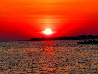 The Sun Preparing To Depart Galveston For The Night photo