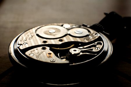 An old pocket watch in brilliant sunlight photo