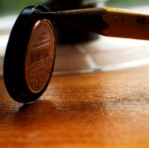 a penny and pencil