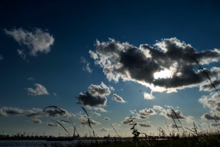 Sun peaking through the Clouds
