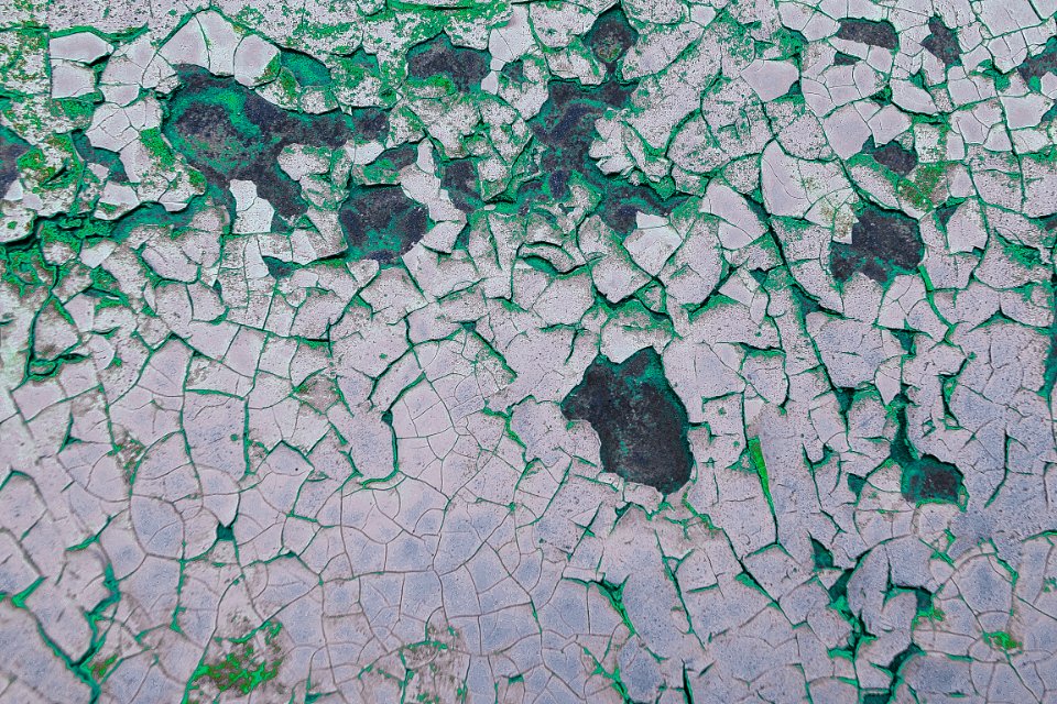 3) Peeling paint on Propane tank like an ariel photograph