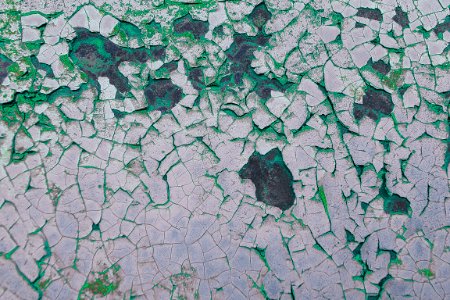 3) Peeling paint on Propane tank like an ariel photograph