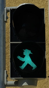 Traffic signal green males photo