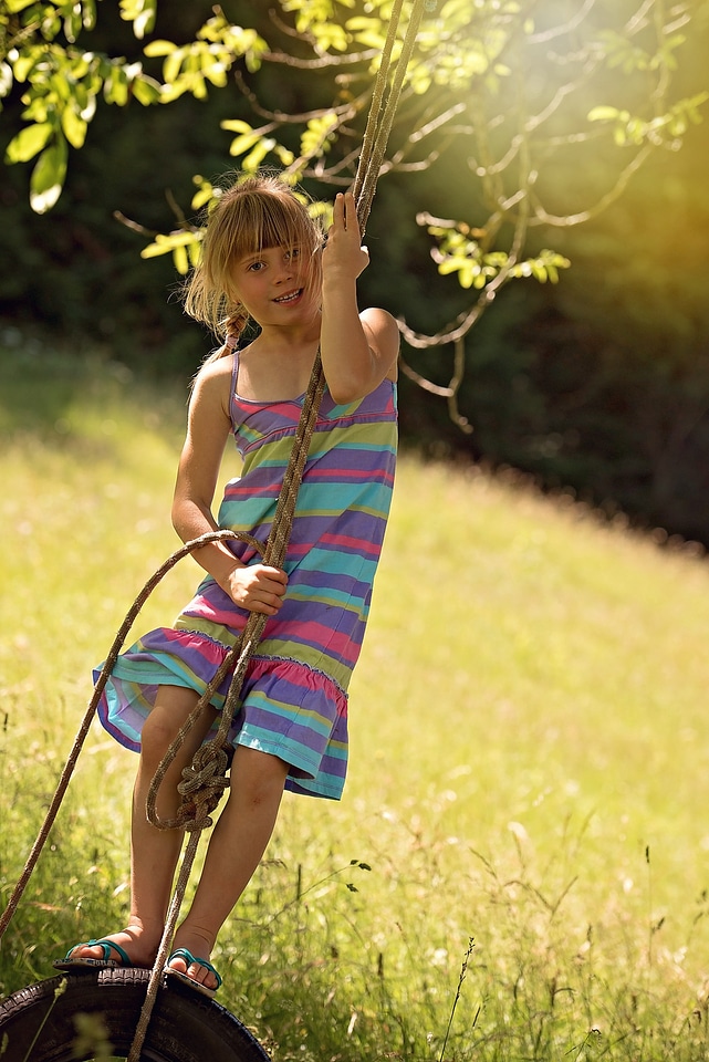 Girl rock tire swing