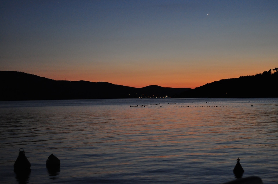 Sun and sea beach evening mood at the lake