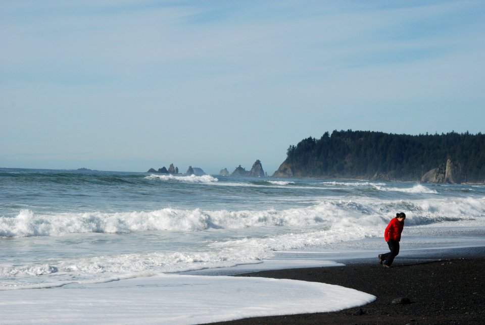 visitor running waves rialto beach tides safety surf coast c bubar march 06 2015