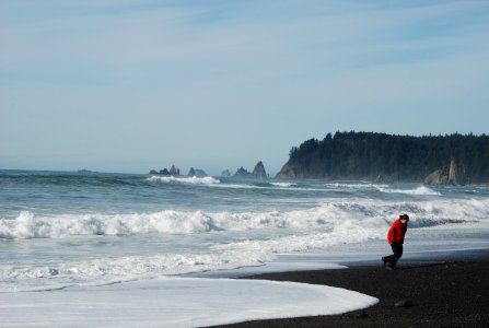 visitor running waves rialto beach tides safety surf coast c bubar march 06 2015